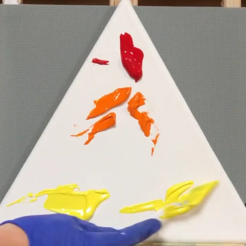 Four-step butterfly drawing tutorial showing the progression from a simple outline to a realistic shaded monarch butterfly.